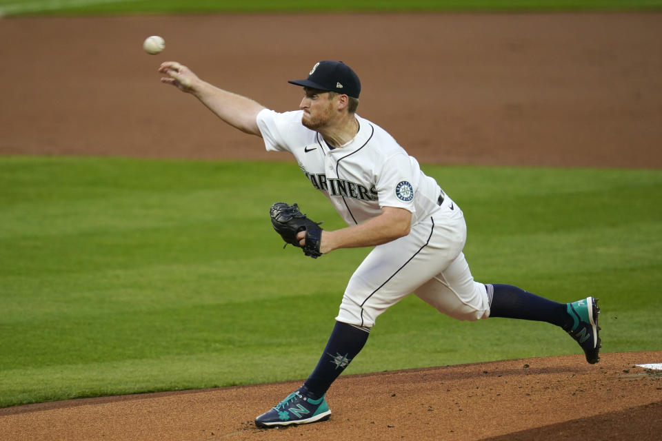 Seattle Mariners pitcher Ljay Newsome throws against the Houston Astros in the first inning of a baseball game Tuesday, Sept. 22, 2020, in Seattle. (AP Photo/Elaine Thompson)