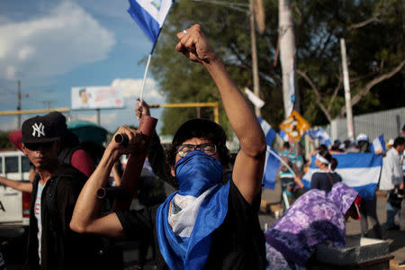 A protester shouts slogans during a protest against Nicaraguan President Daniel Ortega's government in Managua, Nicaragua May 16, 2018. REUTERS/Oswaldo Rivas