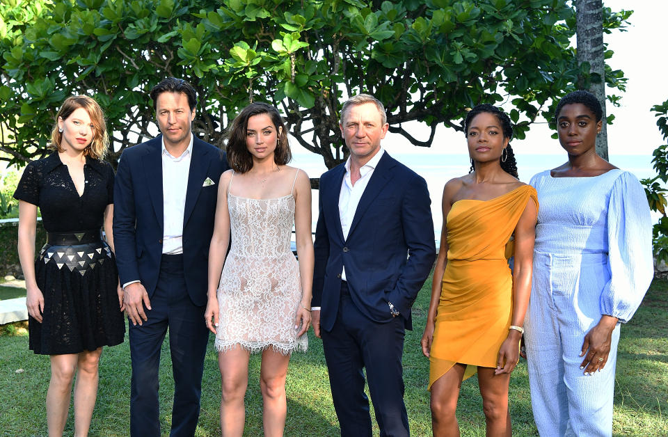 MONTEGO BAY, JAMAICA - APRIL 25:  (L-R) Cast member Lea Seydoux, director Cary Joji Fukunaga, cast members Ana de Armas, Daniel Craig, Naomie Harris and Lashana Lynch attend the 