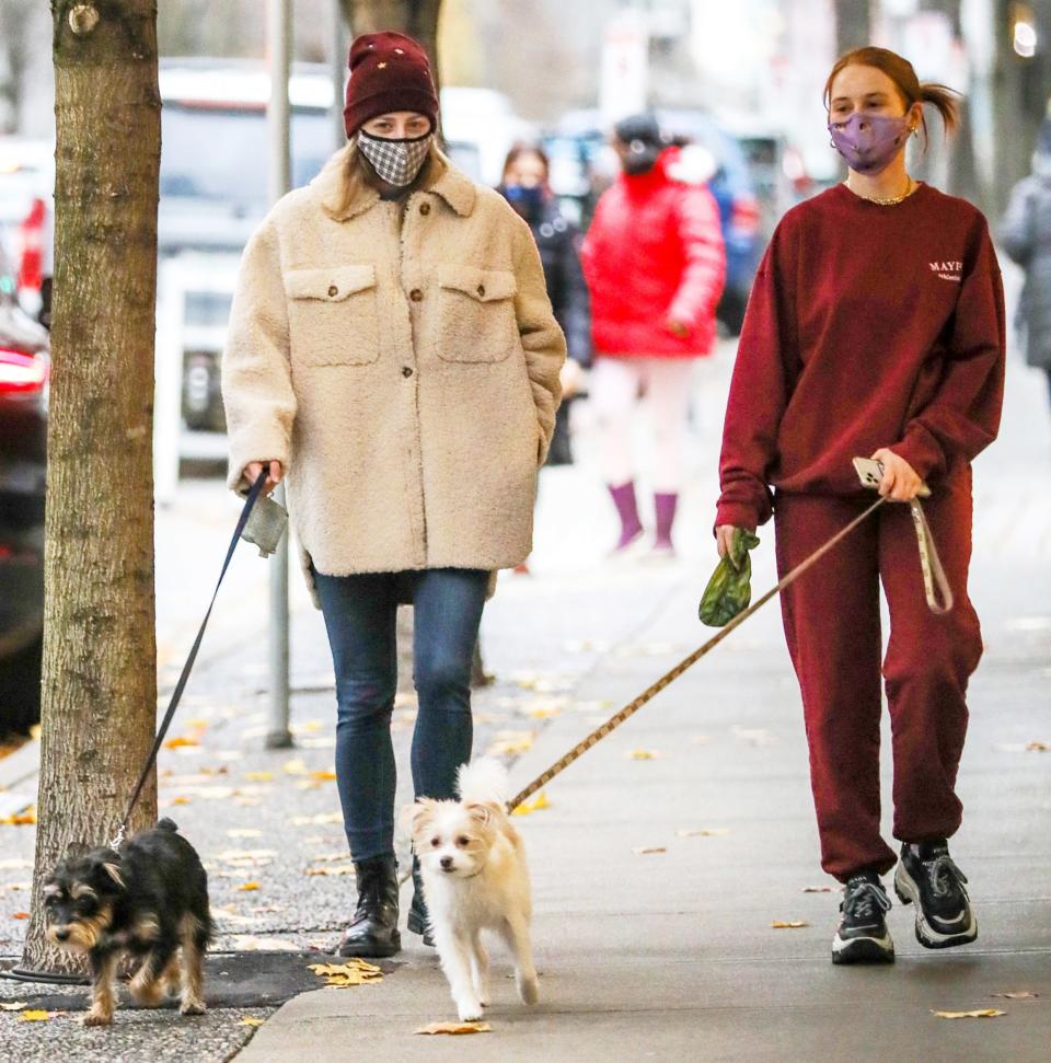 <p><i>Riverdale</i> costars Lili Reinhart and Madelaine Petsch take their furry friends for a walk on Sunday in Vancouver, Canada. </p>