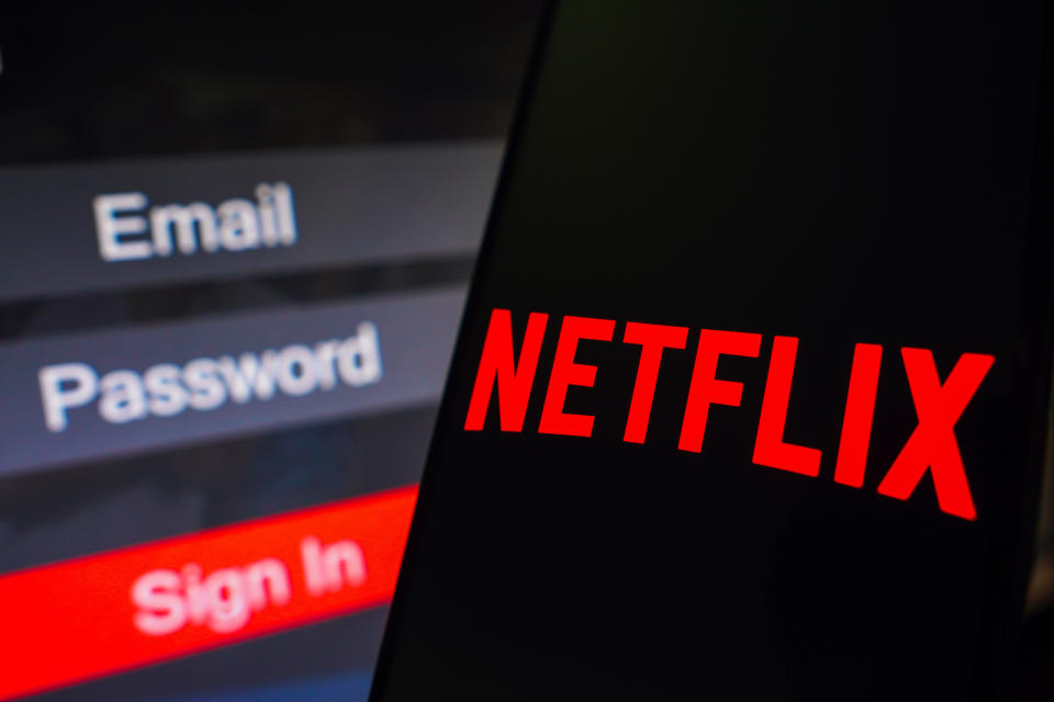 BRAZIL - 2023/05/01: In this photo illustration, the Netflix logo is displayed on a smartphone screen, next to a login screen, with email, password, and sign in. (Photo Illustration by Rafael Henrique/SOPA Images/LightRocket via Getty Images)