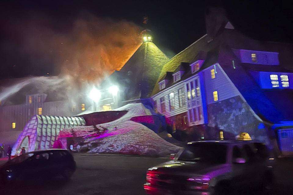 Firefighters extinguish a fire at Oregon's historic Timberline Lodge, which was featured in Stanley Kubrick's 1980 film "The Shining," Thursday evening, April 18, 2024, in Government Camp, Ore. (Clackamas Fire Department via AP)