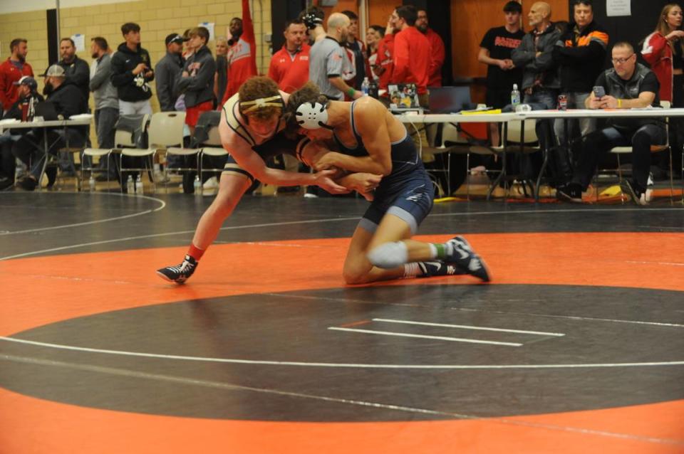 Penns Valley’s Colten Shunk (right) looks to finish off a takedown of Bald Eagle Area’s Dawson Lomison in their 133-pound quarterfinals match of the Laurel Highlands Athletic Conference tournament on Friday at Tyrone. Shunk beat Lomison, 12-4. Nate Cobler/ncobler@centredaily.com