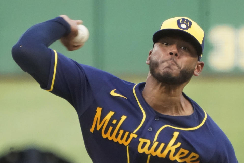 Milwaukee Brewers starter Freddy Peralta pitches against the Pittsburgh Pirates during the first inning of a baseball game Wednesday, Aug. 3, 2022, in Pittsburgh. (AP Photo/Keith Srakocic)