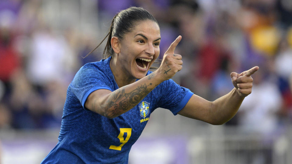 FILE - Debinha (9) celebrates after scoring a goal during the second half of a SheBelieves Cup women's soccer match against Japan, Thursday, Feb. 16, 2023, in Orlando, Fla. The National Women's Soccer League has a lot to be excited about heading into its 11th season. Debinha will play for KC Current. (AP Photo/Phelan M. Ebenhack, File)