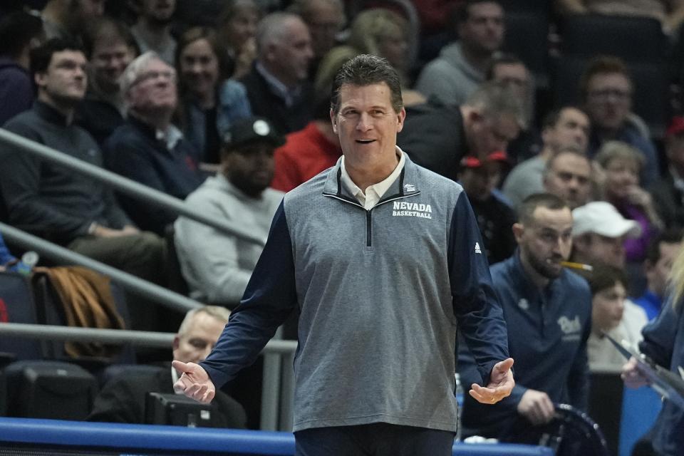 Nevada head coach Steve Alford questions a call during the first half of a First Four college basketball game against Arizona State in the NCAA men's basketball tournament, Wednesday, March 15, 2023, in Dayton, Ohio. (AP Photo/Darron Cummings)