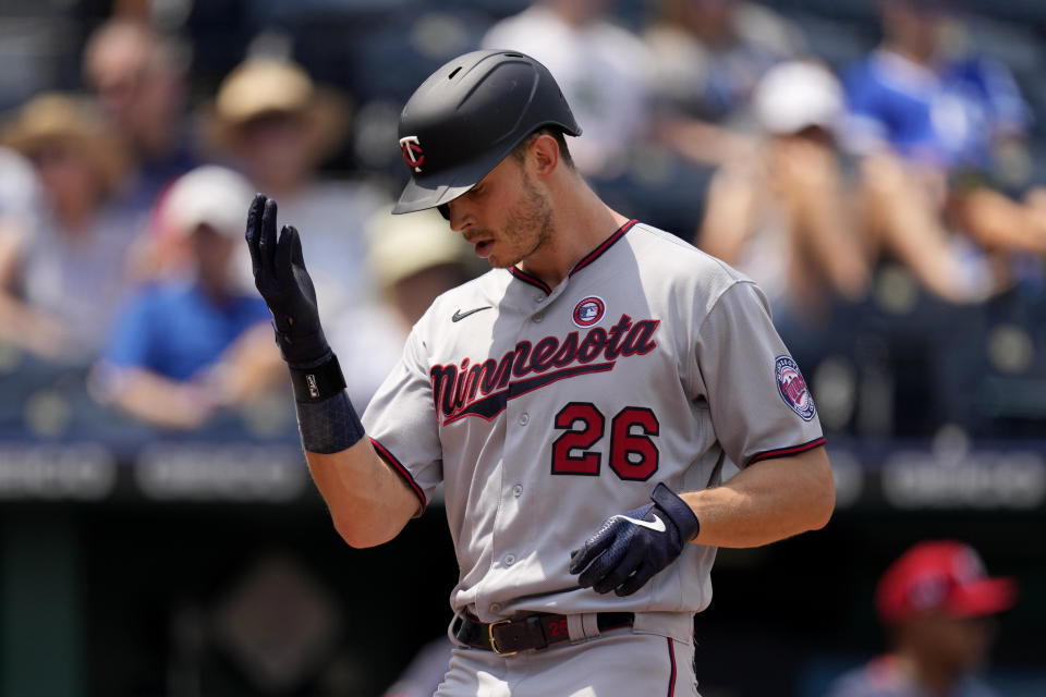 Minnesota Twins' Max Kepler celebrates after hitting a solo home run during the sixth inning of a baseball game against the Kansas City Royals Sunday, July 4, 2021, in Kansas City, Mo. (AP Photo/Charlie Riedel)