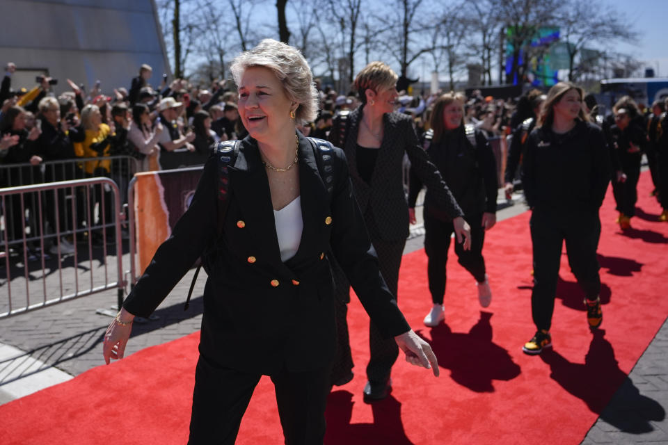 Iowa's head coach Lisa Bluder arrives for the NCAA Women's Final Four championship basketball game against South Carolina on Sunday, April 7, 2024, in Cleveland. (AP Photo/Carolyn Kaster)