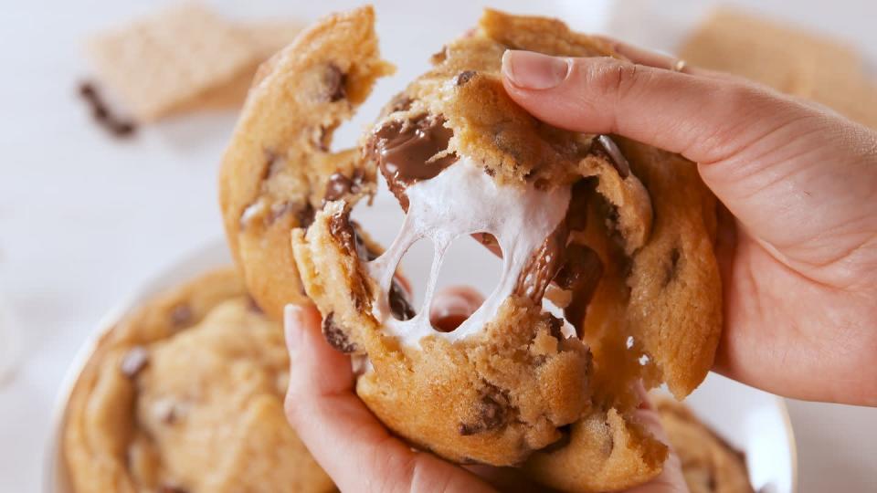 <p>One of the most indulgent desserts <em>ever</em>.</p><p>Get the recipe from <a href="https://www.delish.com/cooking/recipe-ideas/a20641609/smores-stuffed-cookies-recipe/" rel="nofollow noopener" target="_blank" data-ylk="slk:Delish" class="link ">Delish</a>.</p>