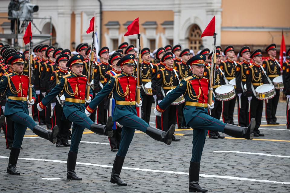 Servicemen march during the military parade marking the 76th anniversary of the Soviet victory in the Great Patriotic War, Russia's term for World War II, on Red Square in Moscow, Russia, May 9, 2021. (Photo by Evgeny Sinitsyn/Xinhua via Getty Images)