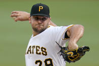 Pittsburgh Pirates starting pitcher Wil Crowe delivers during the first inning of the team's baseball game against the Philadelphia Phillies in Pittsburgh, Friday, July 30, 2021. (AP Photo/Gene J. Puskar)