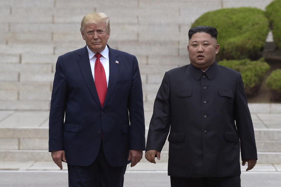 FILE - In this June 30, 2019, file photo, U.S. President Donald Trump, left, meets with North Korean leader Kim Jong Un at the North Korean side of the border at the village of Panmunjom in Demilitarized Zone. North Korea on Friday, Sept. 20, 2019, has praised President Donald Trump for saying Washington may pursue an unspecified "new method" in nuclear negotiations with Pyongyang. (AP Photo/Susan Walsh, File)