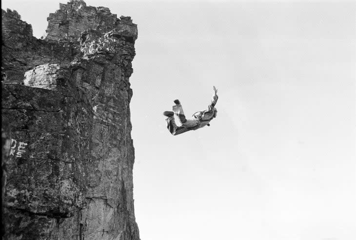 <span class="article__caption">Jean launching off the 1981 site a few days after Carl's death when he attempted to BASE jump from Stabben Pinnacle. </span> (Photo: Arnstein Myskja)