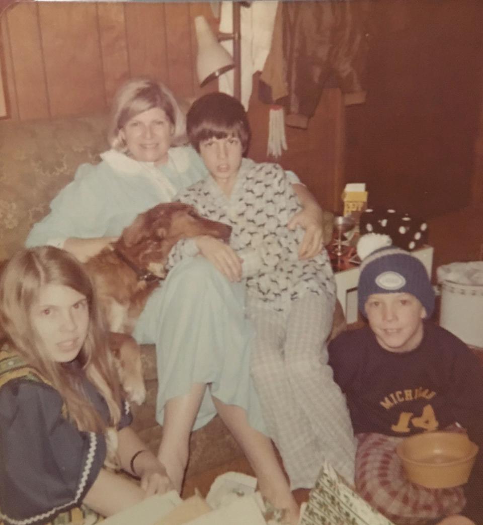 From left, Maura Tracey, dog Tara, (mom) Joan Tracey, Lawrence Tracey and Sean Tracey in their home in Lathrup Village, Mich., circa 1974. Sean Tracey grew up to become a Houston trial lawyer and comes home for summers in Michigan.