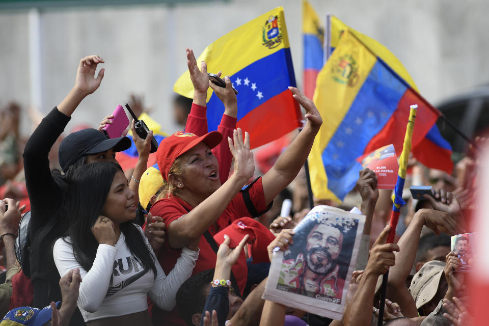 Pro-government supporters cheer during a rally in Caracas, Venezuela, Saturday, Nov. 16, 2019. Crowds gather in the Venezuelan’s capital for rival demonstrations on Saturday. Opposition leader Juan Guaido called for Saturday’s nationwide demonstrations to re-ignite a campaign against President Nicolas Maduro launched in January that has lost steam in recent months. (AP Photo/Matias Delacroix)