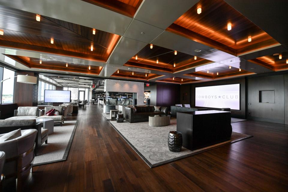 A central seating area in the Cowboys Club, which includes a restaurant and patio overlooking the outdoor practice fields.