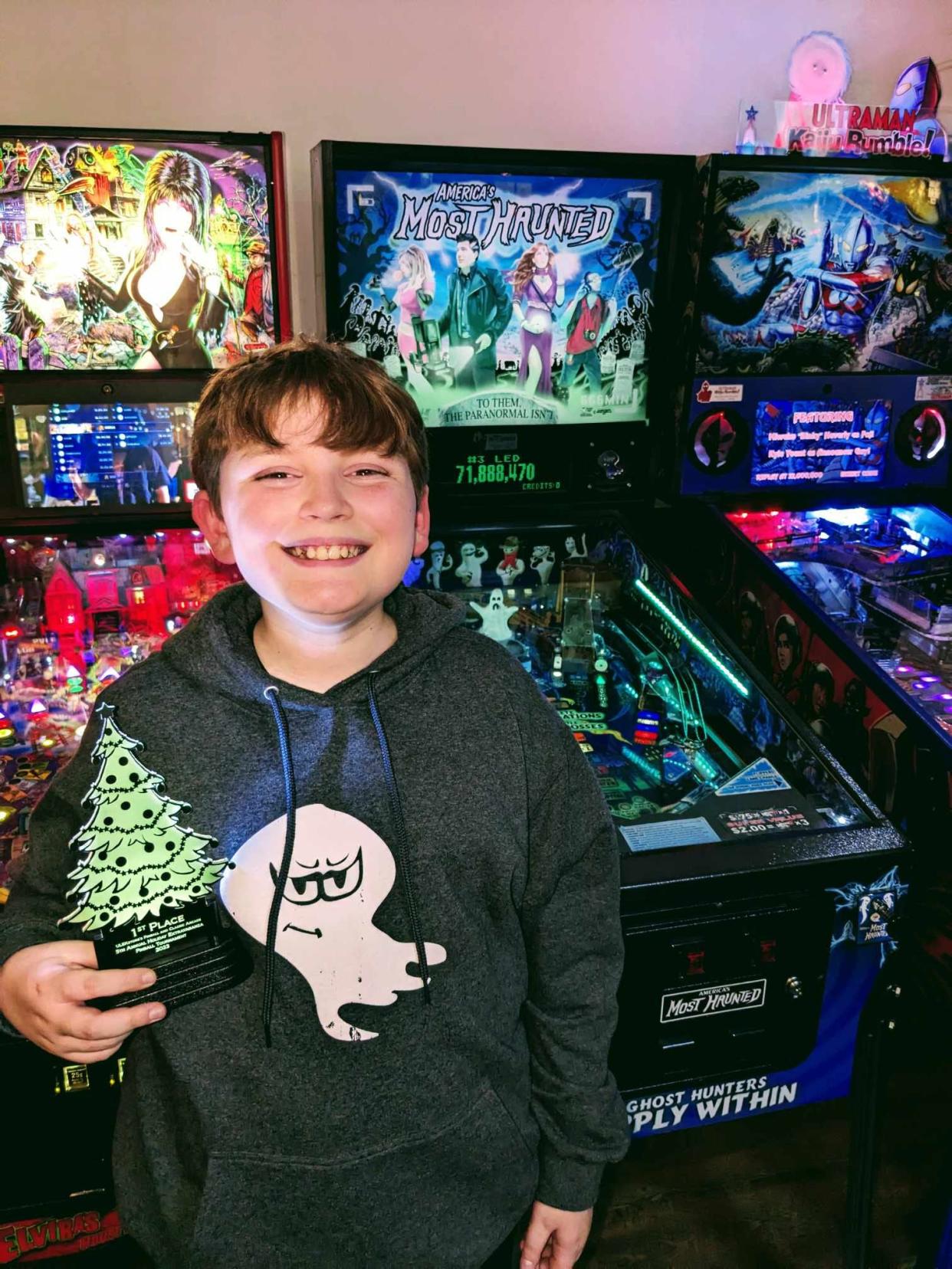 At the annual Holiday Extravaganza pinball tournament sponsored by ULEKstore’s Pinball and Classic Arcade inside the Mall of Monroe, Sterling Mitoska, 12, scored first place out of eight top finalists, walking away with a trophy and cash prize.