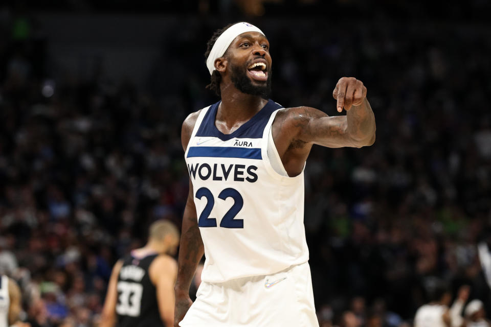 MINNEAPOLIS, MN - APRIL 12: Patrick Beverley #22 of the Minnesota Timberwolves celebrates with fans as time expires against the Los Angeles Clippers in the fourth quarter during a Play-In Tournament game at Target Center on April 12, 2022 in Minneapolis, Minnesota. The Timberwolves won 109-104 to advance to the NBA Playoffs. NOTE TO USER: User expressly acknowledges and agrees that, by downloading and or using this Photograph, user is consenting to the terms and conditions of the Getty Images License Agreement. (Photo by David Berding/Getty Images)