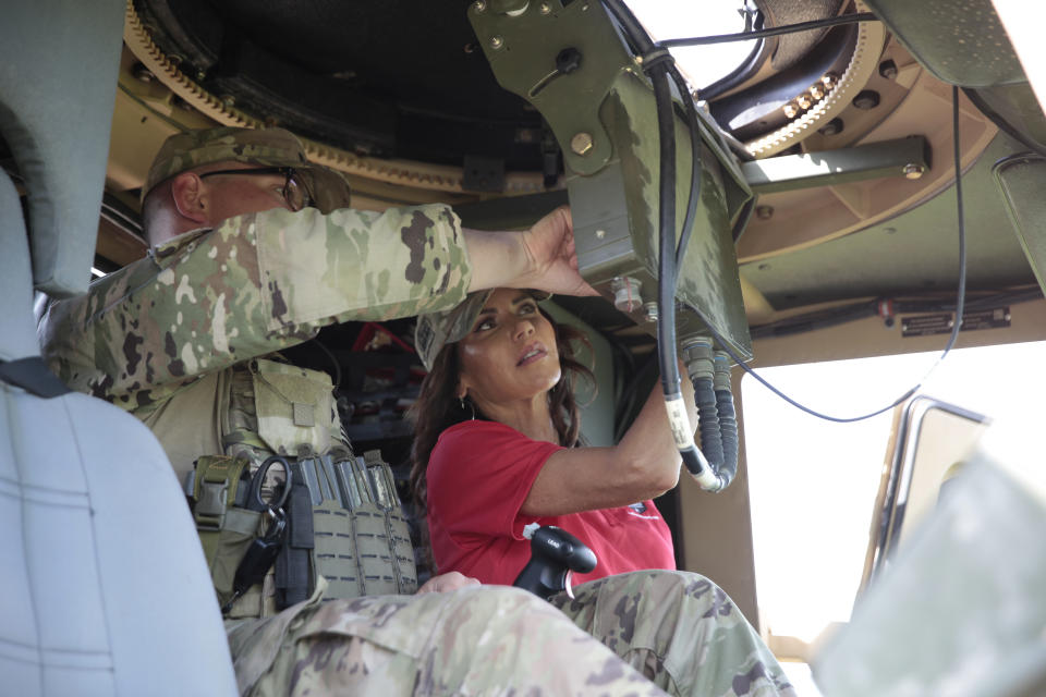 South Dakota Gov. Kristi Noem visited the U.S. border with Mexico on Monday, July 26, 2021, near McAllen, Texas. The Republican governor deployed roughly 50 National Guard troops to help with Texas’ push to arrest people crossing illegally and charge them with state crimes. (AP Photo/Stephen Groves)