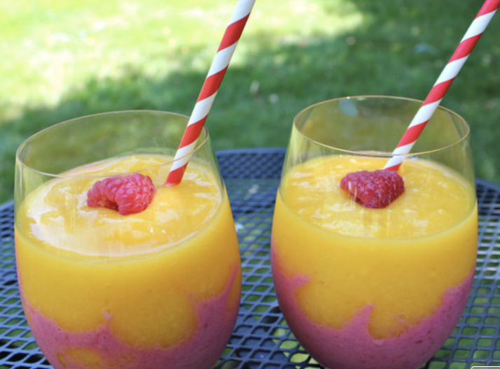 Spiking optional but encouraged. Recipe: Frozen Mango Raspberry Sipper