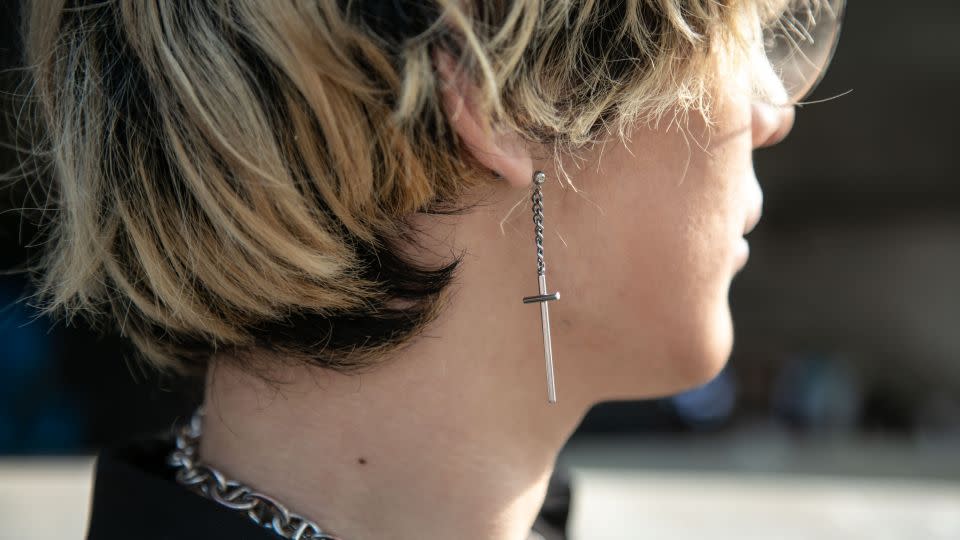 Jeong Gun-ha wears a silver cross earring. - Jean Chung/Getty Images
