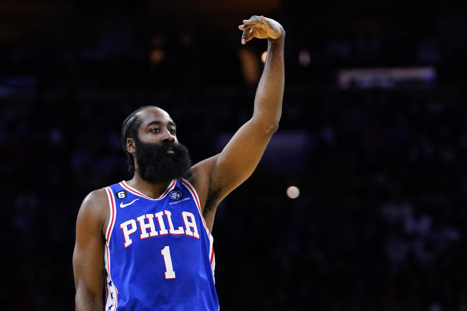 Philadelphia 76ers' James Harden reacts after making a basket during the first half of an NBA basketball game against the Milwaukee Bucks, Thursday, Oct. 20, 2022, in Philadelphia. (AP Photo/Matt Slocum)