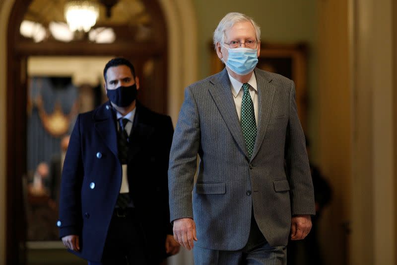 Senate Majority Leader McConnell walks to his office from the Senate Chamber on Capitol Hill in Washington