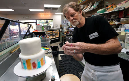 Baker Jack Phillips decorates a cake in his Masterpiece Cakeshop in Lakewood, Colorado U.S. September 21, 2017. Picture taken September 21, 2017. REUTERS/Rick Wilking