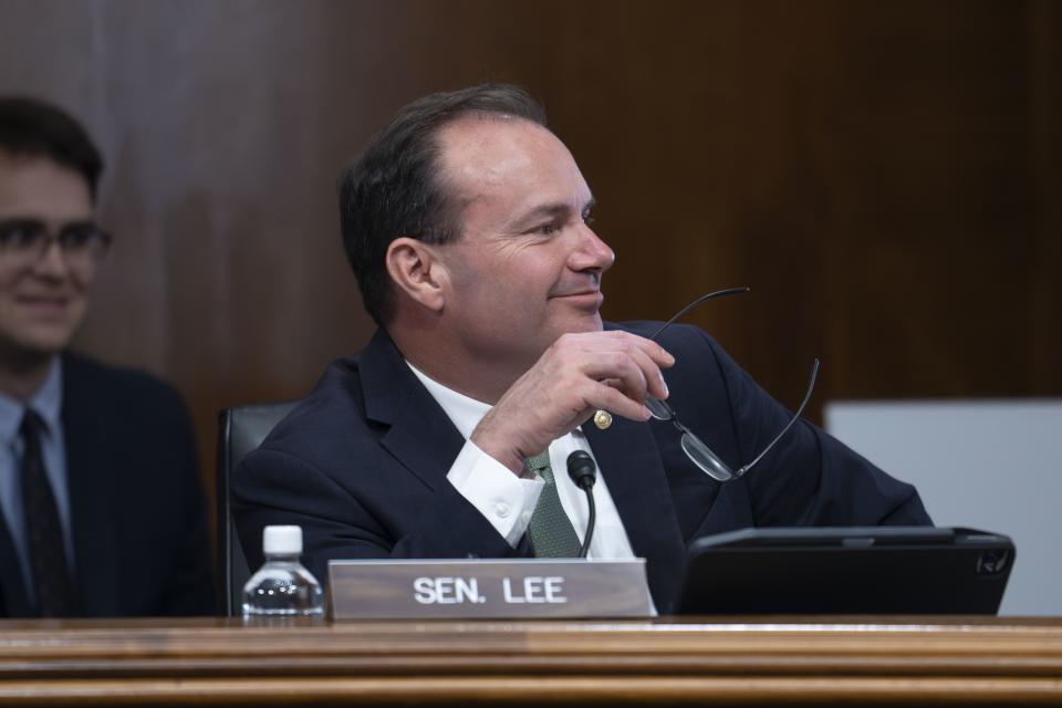 Sen. Mike Lee attends a hearing of the Senate Energy and Natural Resources Committee at the Capitol in Washington.