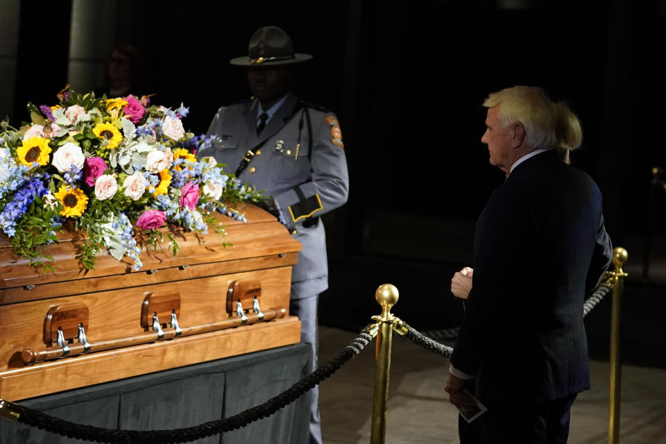 Georgia House Speaker Jon Burns pays respects to former first lady Rosalynn Carter at the Jimmy Carter Presidential Library and Museum in Atlanta, Monday, Nov. 27, 2023, during the public repose. (AP Photo/Brynn Anderson, Pool)