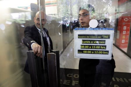 Members of private security are seen during a security operation after armed robbers stole gold coins worth more than $2 million, outside Casa de Moneda in Mexico City