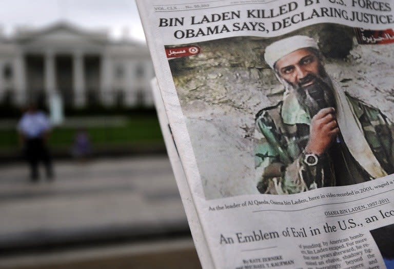 A newspaper reports on the death of Al-Qaeda leader Osama bin Laden in Washington, DC, on May 2, 2011. The Navy SEAL who killed Osama bin Laden broke his silence, recounting in an interview the night he shot the Al-Qaeda leader three times and the financial anxiety he now faces as an unemployed civilian