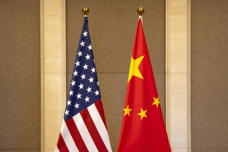 FILE - U.S. and Chinese flags are set up at the Diaoyutai State Guesthouse in Beijing, on July 8, 2023. Lured by the large U.S. market, Chinese businesses are coming to the U.S. with money, jobs and technology, only to find rising suspicion at a time of an intensifying U.S.-China rivalry that has spread into the business world. (AP Photo/Mark Schiefelbein, Pool, File)