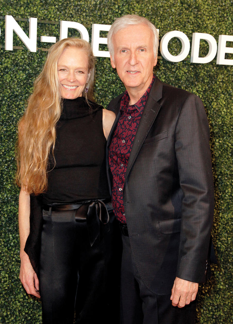 Cameron with wife Suzy Amis, with whom the director shares three children, plus one each from a previous marriage.