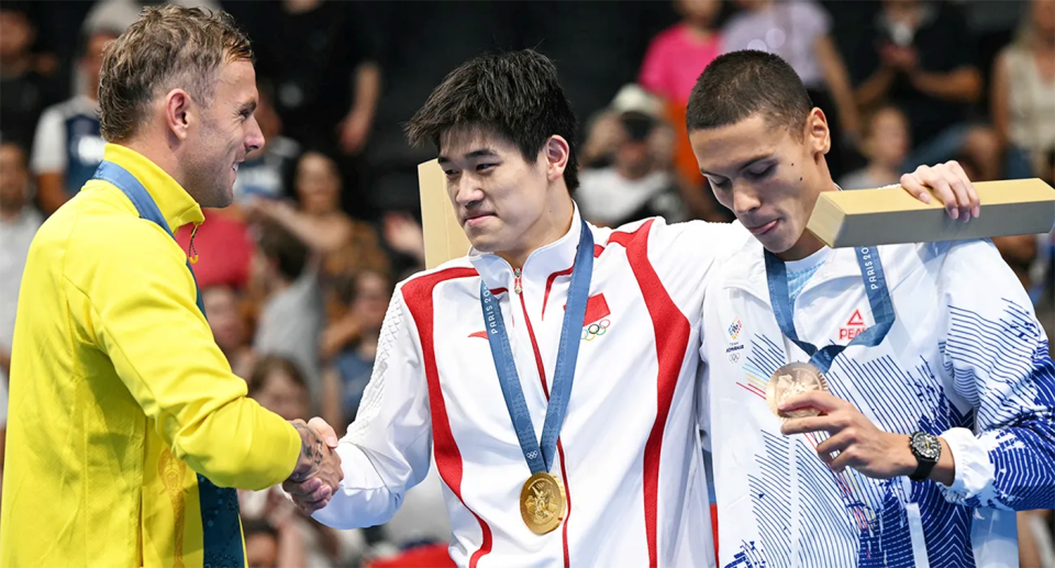 Aussie swimmer Kyle Chalmers congratulates Chinese rival Pan Zhanle after his gold medal at the Paris Olympics. Pic: Getty