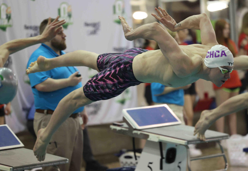 CHCA's Logan Ottke competes in the boys 100-yard breaststroke at the 2022 OHSAA State Swimming and Diving Championships.