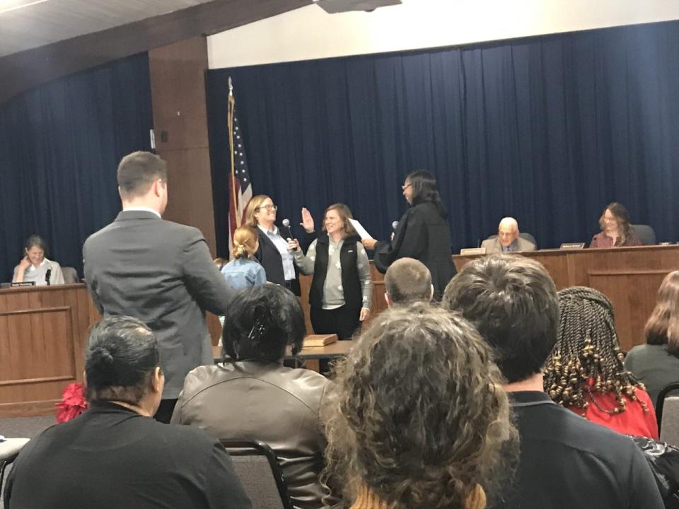 Vice Chair Amy Ray is sworn in at a Dec. 15, 2022 Asheville Board of Education meeting.