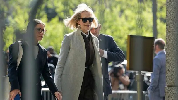 PHOTO: Former advice columnist E. Jean Carroll walks into Manhattan federal court, April 25, 2023, in New York. (Seth Wenig/AP)