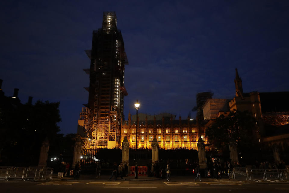 A general view of the Parliament at night in London, Wednesday, Sept. 4, 2019. With Britain's prime minister weakened by a major defeat in Parliament, defiant lawmakers were moving Wednesday to bar Boris Johnson from pursuing a "no-deal" departure from the European Union. (AP Photo/Matt Dunham)