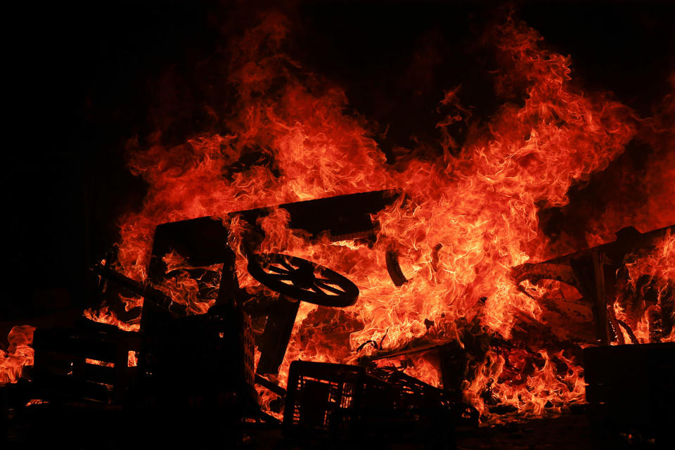 <p>Barricades burn as protesters clash with riot police during the protests at the G20 summit in Hamburg, Germany, July 7, 2017. (Hannibal Hanschke/Reuters) </p>