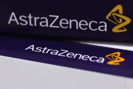 The logo of AstraZeneca is seen on medication packages in a pharmacy in London April 28, 2014. REUTERS/Stefan Wermuth