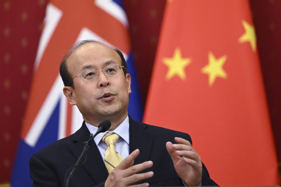 China's ambassador to Australia Xiao Qian speaks during the New Year's press gathering at the Chinese Embassy in Canberra, Tuesday, Jan. 10, 2023. Xiao told reporters that China had shifted its COVID-19 strategy late last year from preventing infections to preventing severe cases. (Dean Lewins/AAP Image via AP)