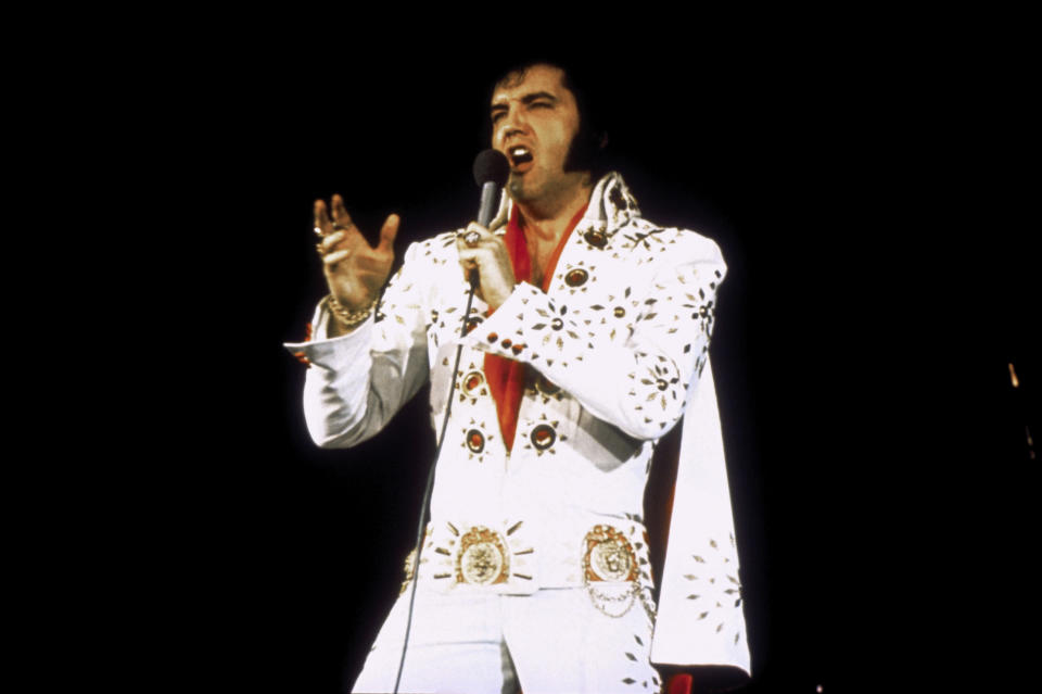 American singer Elvis Presley performing on tour. (Photo by Courtesy of Metro Goldwyn Mayer/Sunset Boulevard/Corbis via Getty Images)