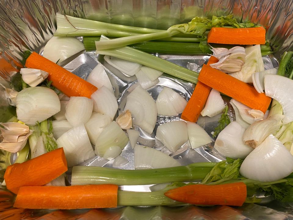 Carrots and celery in a pan.