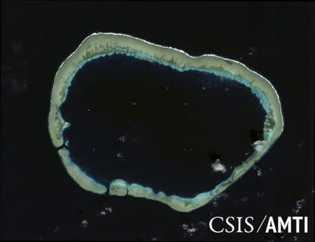 Mischief Reef is shown in this handout satellite image dated January 24, 2012 and provided by CSIS Asia Maritime Transparency Initiative/Digital Globe September 14, 2015. REUTERS/CSIS Asia Maritime Transparency Initiative/Digital Globe/Handout via Reuters