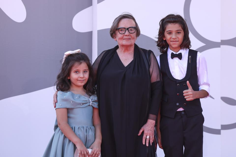 Talia Ajjan, from left, director Agnieszka Holland and Talia Ajjan pose for photographers upon arrival for the premiere of the film 'Green Border' during the 80th edition of the Venice Film Festival in Venice, Italy, on Tuesday, Sept. 5, 2023. (Photo by Vianney Le Caer/Invision/AP)