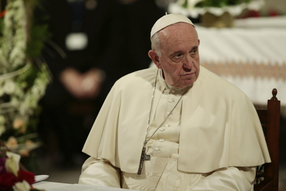 Pope Francis sits during a meeting with Catholic priests and other Christian representatives in the cathedral of the capital, Rabat, Morocco, Sunday, March 31, 2019. Pope Francis is in Morocco for a two-day trip aimed at highlighting the North African nation's Christian-Muslim ties, while also showing solidarity with migrants at Europe's door and tending to a tiny Catholic flock. (AP Photo/Mosa'ab Elshamy)