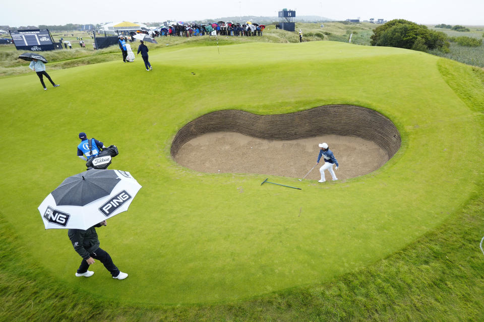 Scotland's Ewen Ferguson gets out of a bunker on 17 after a shot during a practice round for the British Open Golf Championships at the Royal Liverpool Golf Club in Hoylake, England, Tuesday, July 18, 2023. The Open starts Thursday, July 20. (AP Photo/Jon Super)