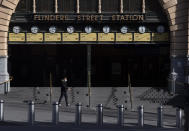 Flinders Street Station is quiet during lockdown due to the continuing spread of the coronavirus in Melbourne, Thursday, Aug. 6, 2020. Victoria state, Australia's coronavirus hot spot, announced on Monday that businesses will be closed and scaled down in a bid to curb the spread of the virus. (AP Photo/Andy Brownbill)