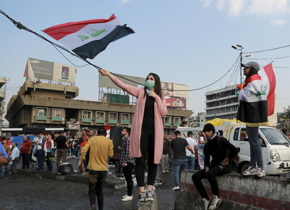 Anti-government protesters gather in Tahrir square during a demonstration in Baghdad, Iraq, Wednesday, Oct. 30, 2019. Anti-government protests in Iraq gained momentum Wednesday with tens of thousands of people gathered in a central square in Baghdad and across much of the country's Shiite-majority central southern provinces. (AP Photo/Hadi Mizban)